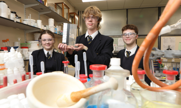 Synthite science prize winner Oliver Lloyd, Elfed High School, Buckley (centre) with runners up Neve Gilham and Tomas Davies